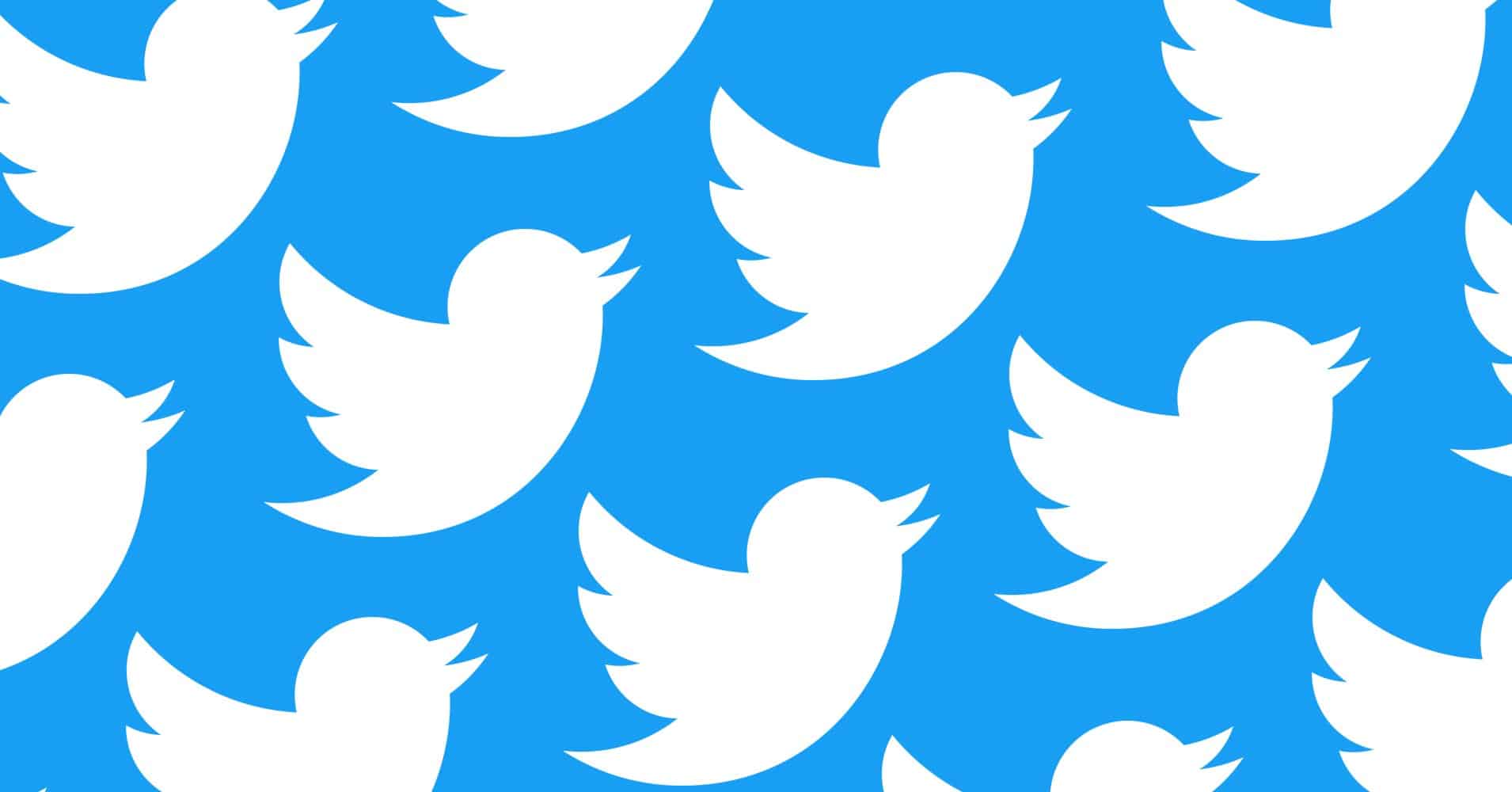 Le logo de Twitter en mosaïque sur fond bleu