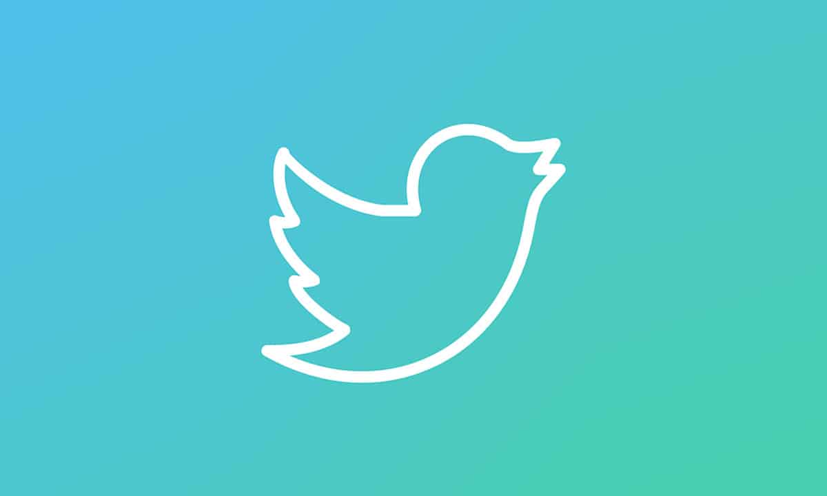 Le logo de Twitter sur un fond dégradé bleu.