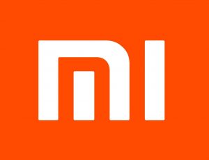Logo de Xiaomi. Lors de sa conférence annuelle, Xiaomi a annoncé son arrivée dans le secteur des véhicules électriques intelligents.