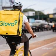 A Glovo delivery man.
