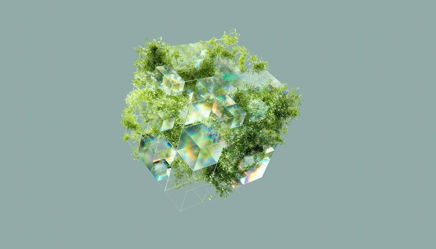 un cube abstrait vert avec des plantes dessus