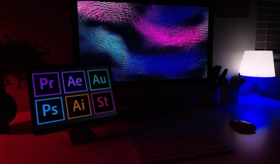 Les logos de la suite Adobe sur un bureau.